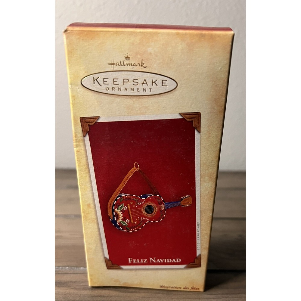 Hallmark Keepsake NEW 2004 "Feliz NAVIDAD Christmas Ornament with Leather strap